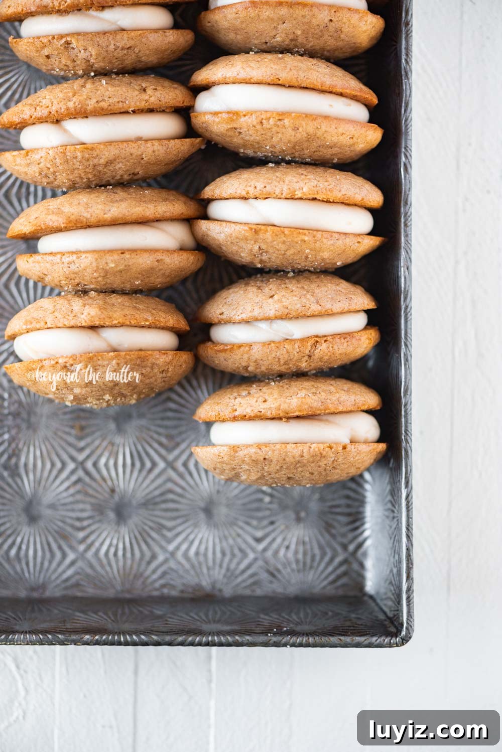 Apple Cider Whoopie Pies with Cinnamon Buttercream Filling 2 Apple Cider Whoopie Pies with Caramel Cream Cheese Frosting | All Images © Beyond the Butter, LLC