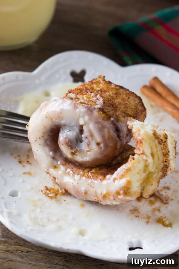 Fluffy Eggnog Cinnamon Rolls with Creamy Eggnog Glaze 5 Eggnog Cinnamon Rolls. These super fluffy cinnamon buns are made with eggnog, filled with spices, and drizzled with eggnog glaze.
