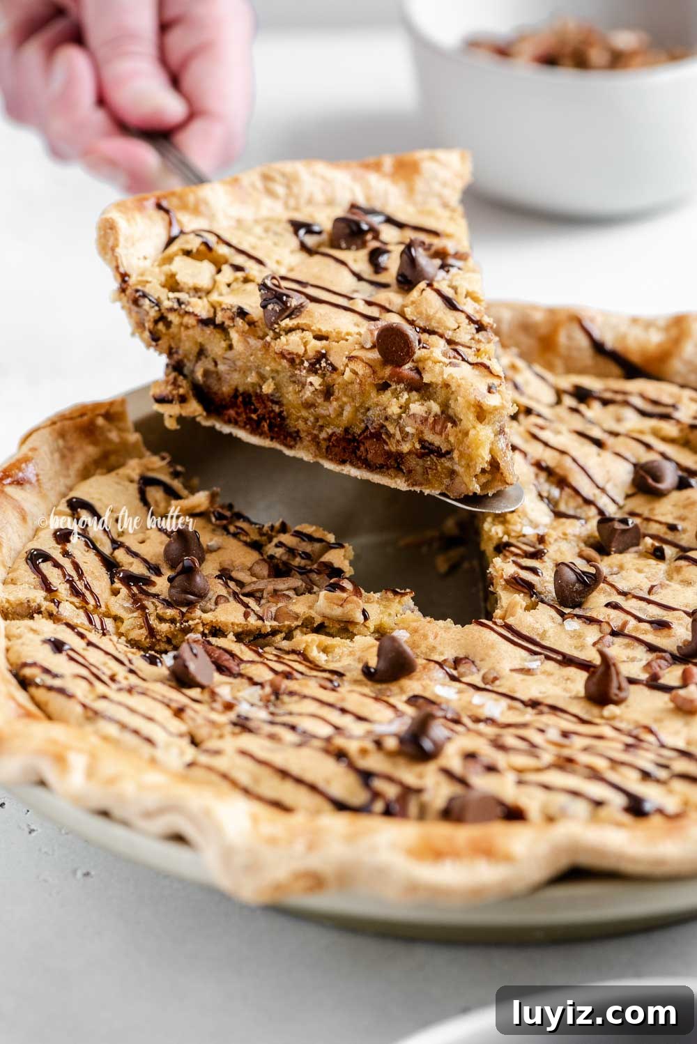 Ultimate Chocolate Chip Pie Recipe: Gooey, Crispy, and Irresistible 4 Closeup image of slice of chocolate chip pie being served