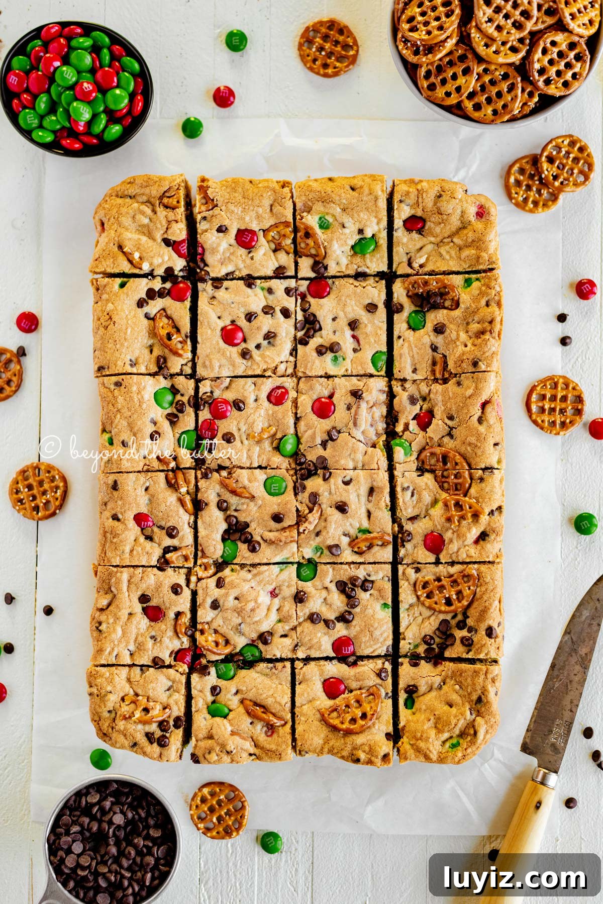 Holiday Chocolate Chip Cookie Bars for Festive Baking 4 Overhead image of easy holiday chocolate chip cookie bars cut into squares | All Images © Beyond the Butter®
