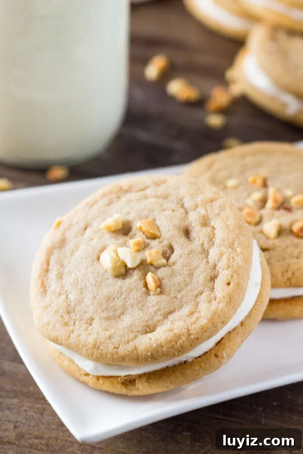 Fluffernutter Sandwich Cookies: Peanut Butter & Marshmallow Treats 4 Fluffernutter Cookies. Two soft & chewy peanut butter cookies sandwiched together with fluffy marshmallow frosting. Pure salty-sweet peanut butter bliss!