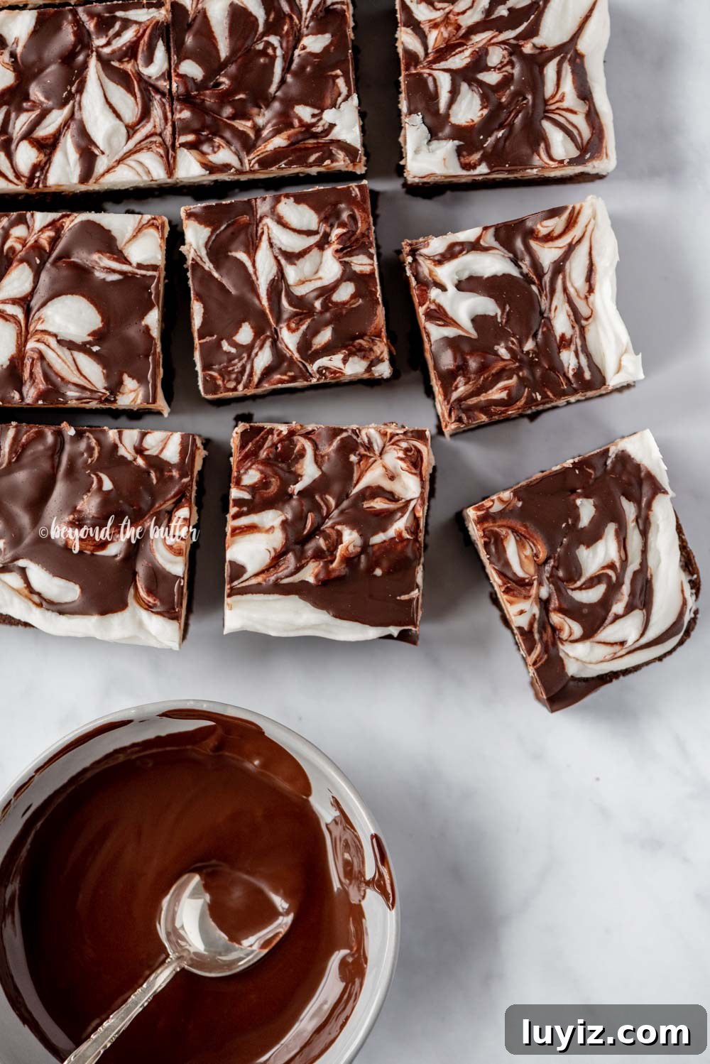 Peppermint Chocolate Swirl Brownies — Festive Fudgy Recipe 5 Squares of Chocolate Peppermint Swirled Brownies | All Images © Beyond the Butter, LLC