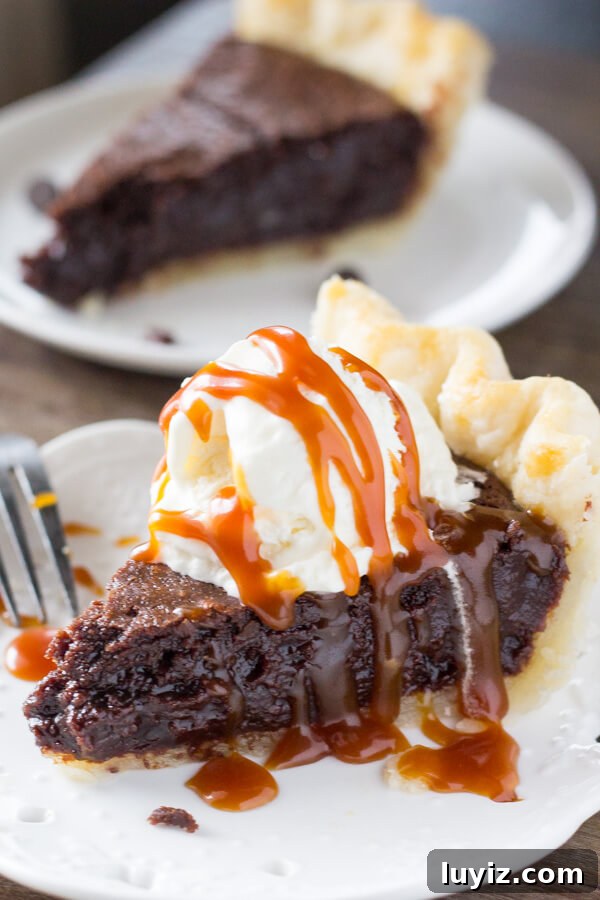 Marshmallow Oreo Brownies Recipe — Gooey Chocolate Cookie Bars 8 This easy, homemade Fudge Brownie Pie features a flaky, golden pie crust shell filled with the gooiest, fudgiest brownie. Serve it with ice cream & caramel sauce for the ultimate treat!