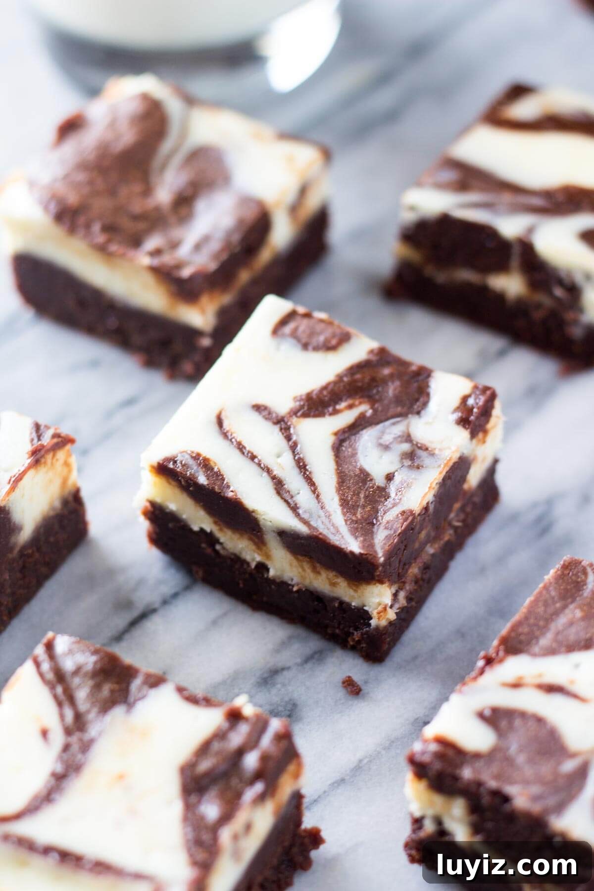 Marshmallow Oreo Brownies Recipe — Gooey Chocolate Cookie Bars 9 Cream Cheese Brownies - Super fudgy, chocolatey brownies swirled with a layer of classic cheesecake. These are the ULTIMATE dessert!