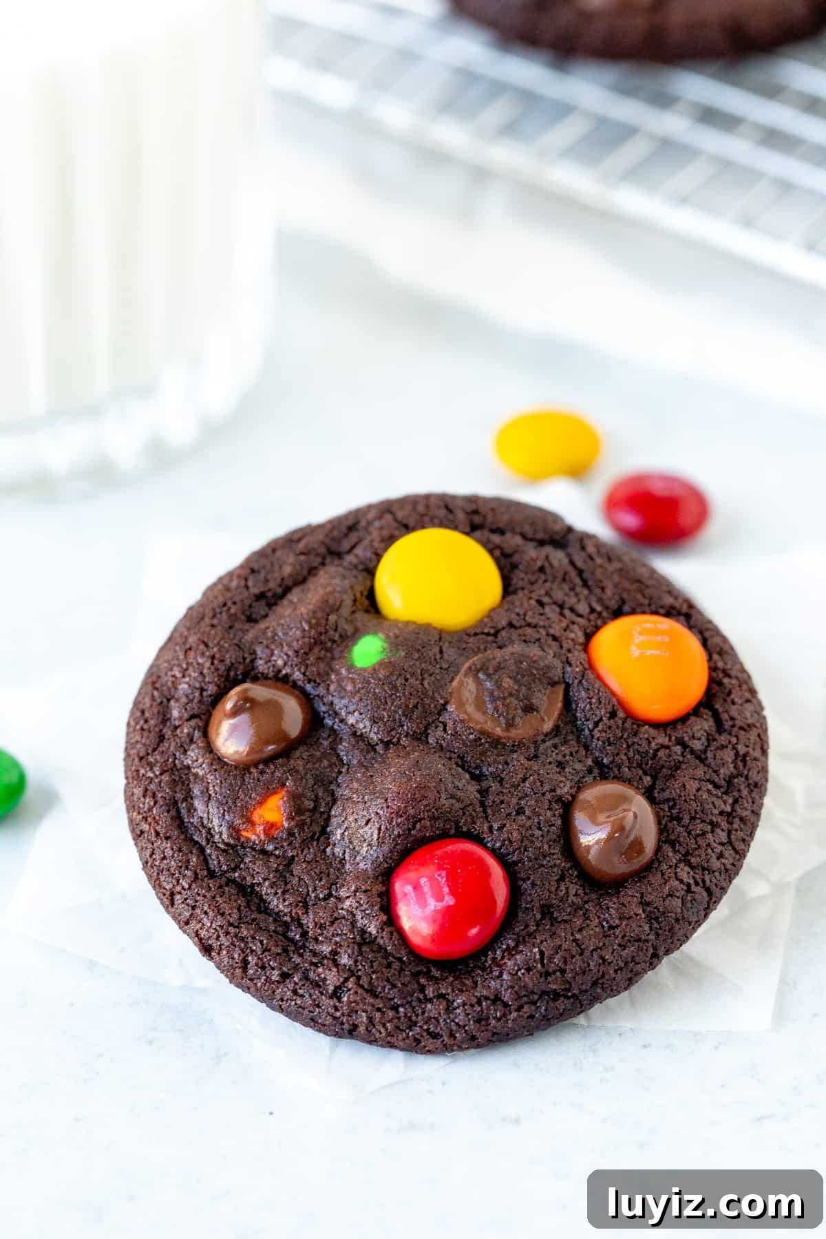 Crispy M&M Chocolate Cookie Recipe for Perfect Party Treats 3 M&M chocolate cookie with glass of milk