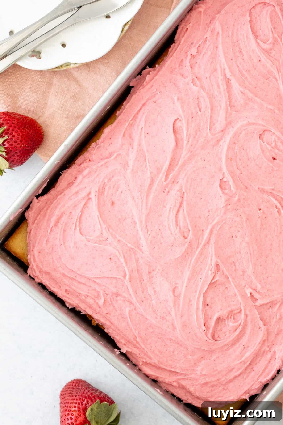 Vanilla Layer Cake with Strawberry Buttercream Frosting 4 Sheet pan of vanilla cake frosted with strawberry buttercream