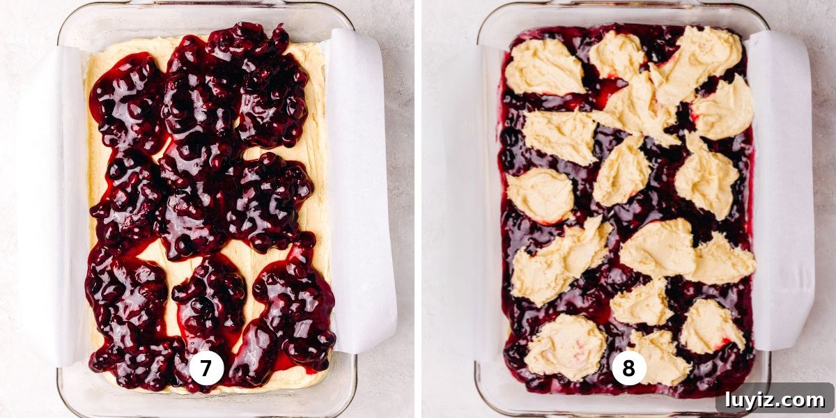 Blueberry Swirl Coffee Cake Recipe with Streusel Topping 11 Glass baking dish layered with coffee cake batter, blueberry pie filling, topped with spoonfuls of more coffee cake batter.