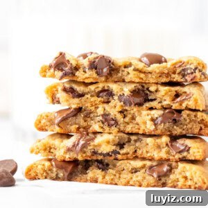 Peanut Butter Banana Chocolate Chip Cookies Recipe for Chewy Treats 8 Peanut butter banana cookies broken in half and stacked on top of each other.