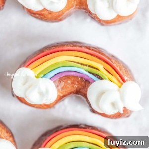 How to Make Vibrant Rainbow Donuts at Home 13 Overhead closeup image of homemade Rainbow Donuts.