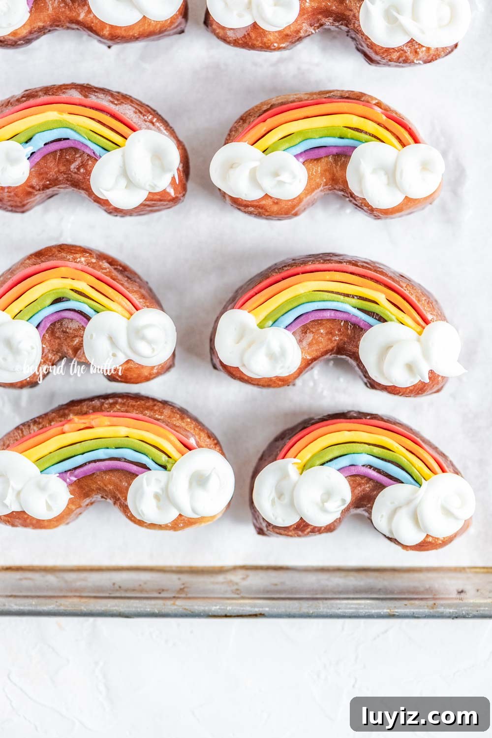 How to Make Vibrant Rainbow Donuts at Home 5 Overhead image of homemade Rainbow Donuts | All Images © Beyond the Butter, LLC