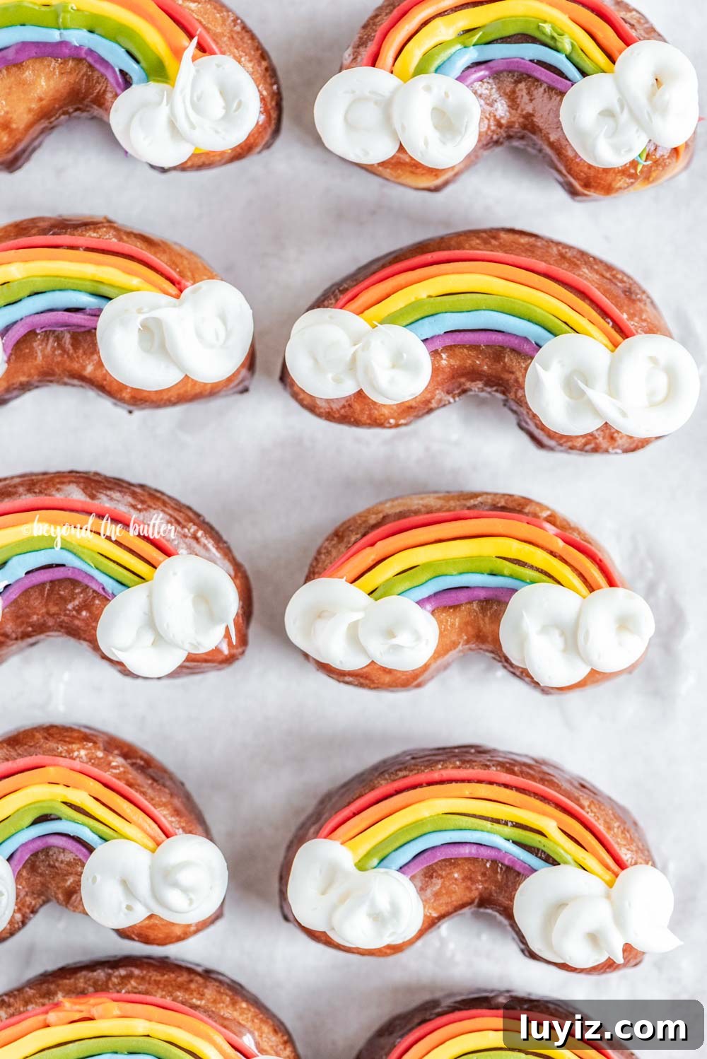 How to Make Vibrant Rainbow Donuts at Home 6 Overhead image of homemade Rainbow Donuts | All Images © Beyond the Butter, LLC