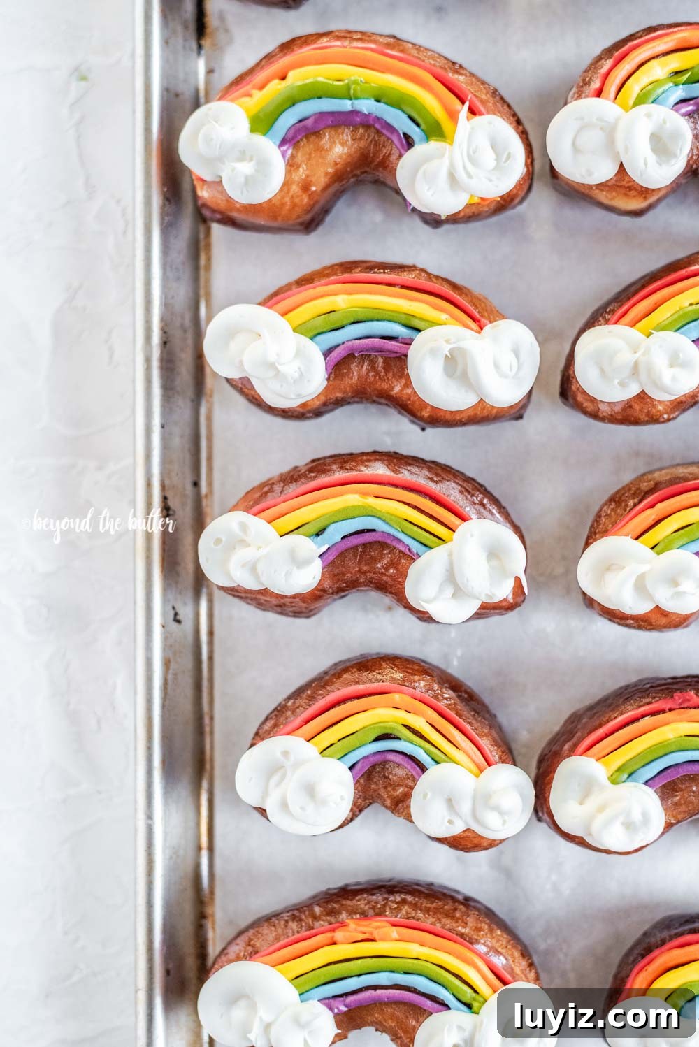 How to Make Vibrant Rainbow Donuts at Home 7 Overhead image of homemade Rainbow Donuts | All Images © Beyond the Butter, LLC