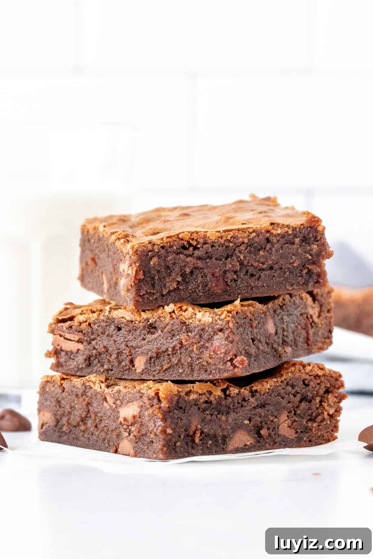 Decadent Milk Chocolate Brownies Recipe — Rich, Gooey Squares 2 Stack of 3 milk chocolate brownies