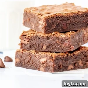 3 chewy brownies stacked on top of each other