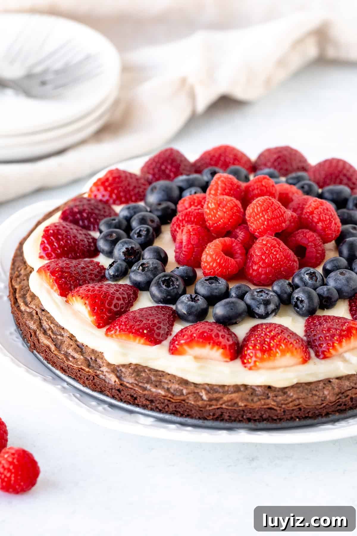 Decadent Brownie Fruit Pizza Recipe with Fresh Berries 2 Brownie fruit pizza with cream cheese topping and berries