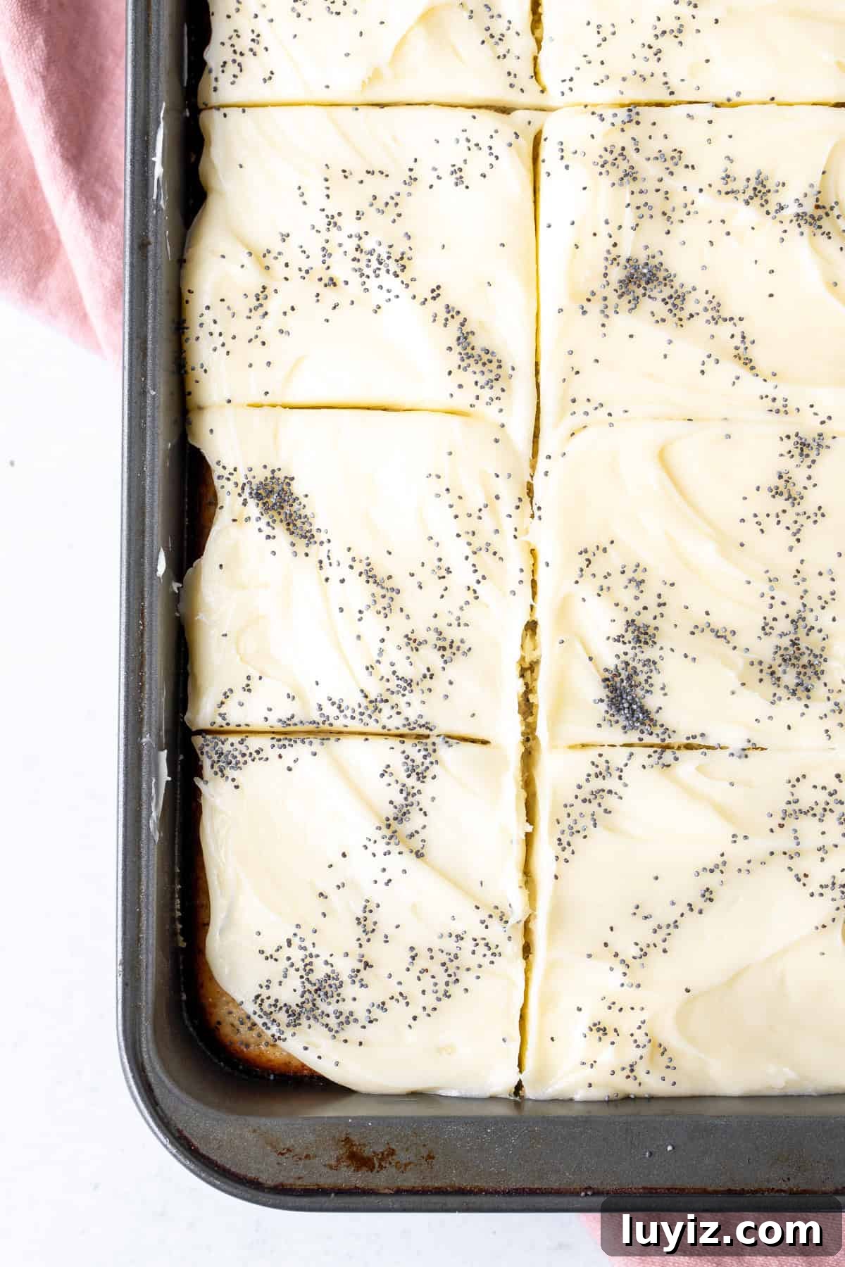 Lemon Poppy Seed Cake with Cream Cheese Frosting Recipe 7 9x13 inch pan of lemon poppy seed cake with cream cheese frosting, cut into squares
