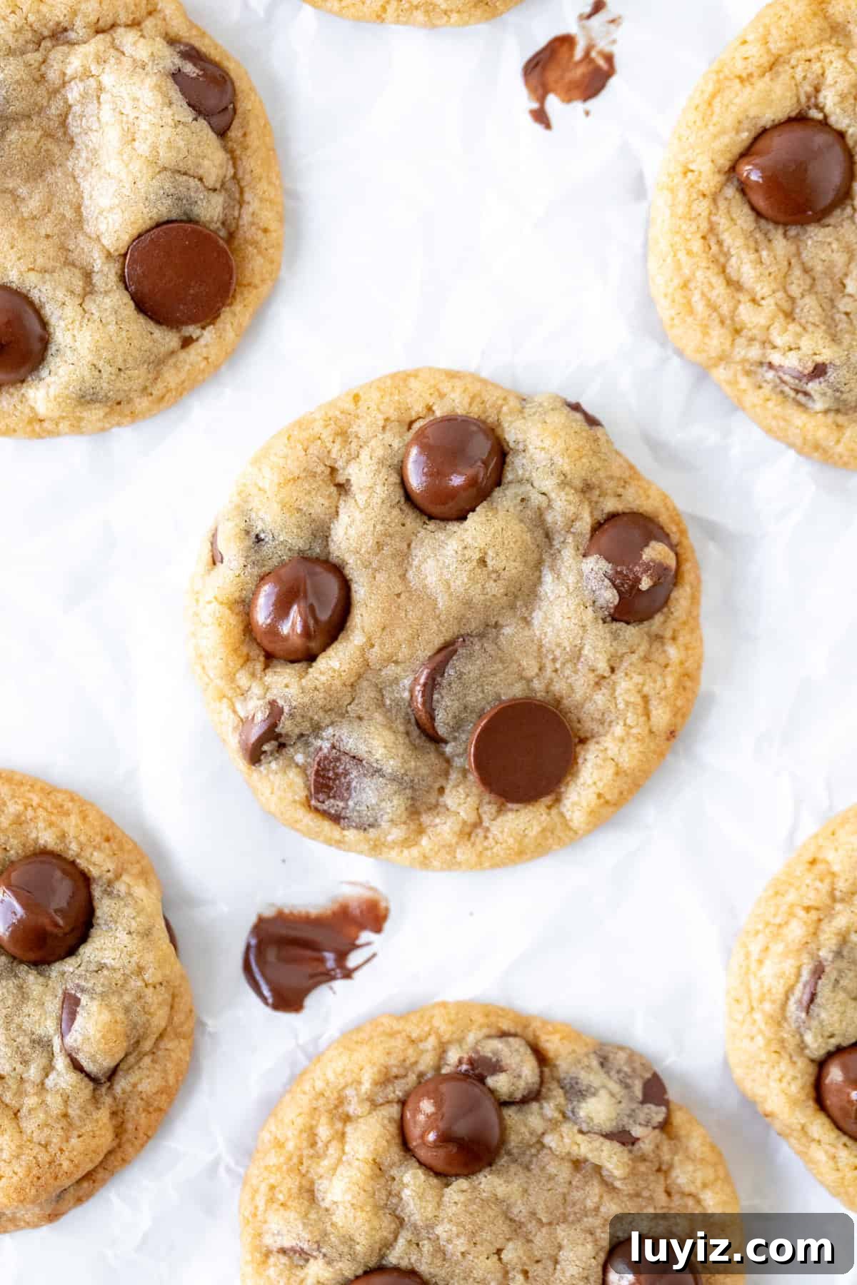 Mini Chocolate Chip Cookie Recipe: Bite-Sized Cookies for Snacking 3 Mini chocolate chip cookies on baking paper