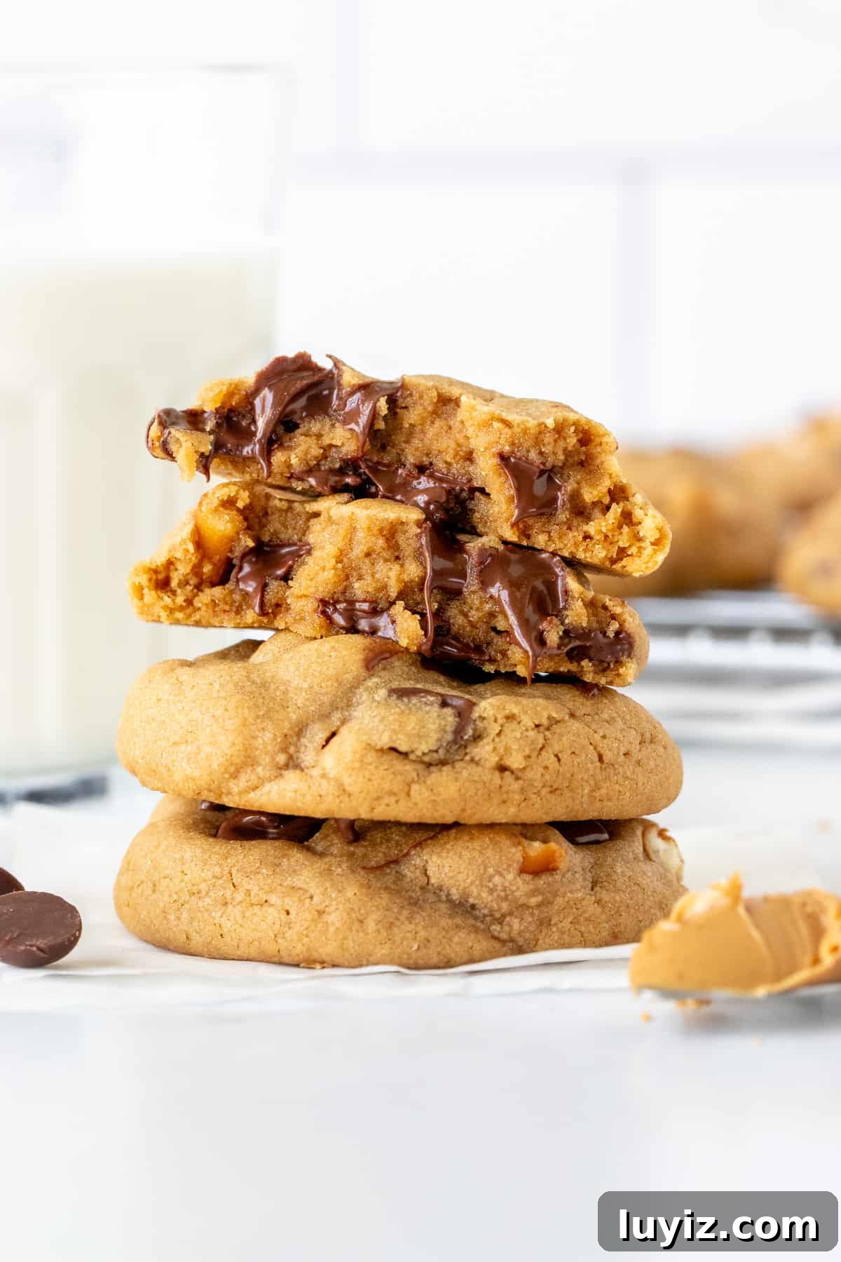 Peanut Butter Pretzel Chocolate Chip Cookies Recipe 7 Stack of peanut butter pretzel cookies, with top cookie broken in half