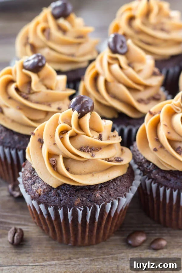 Mocha Cupcakes with Silky Coffee Buttercream Frosting 3 Moist, soft, fudgy chocolate cupcakes infused with coffee and topped with fluffy coffee frosting. These mocha cupcakes are perfect for true coffee lovers!