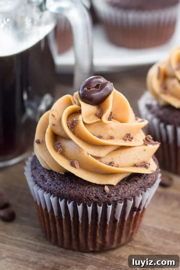 Mocha Cupcakes with Silky Coffee Buttercream Frosting 6 Moist, soft, fudgy chocolate cupcakes infused with coffee and topped with fluffy coffee frosting. These mocha cupcakes are perfect for true coffee lovers!