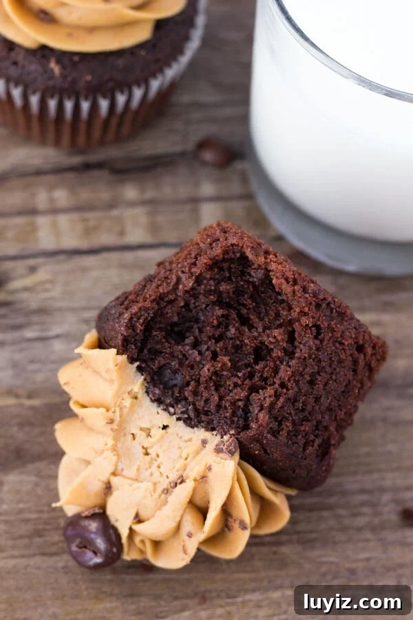 Mocha Cupcakes with Silky Coffee Buttercream Frosting 8 Moist, soft, fudgy chocolate cupcakes infused with coffee and topped with fluffy coffee frosting. These mocha cupcakes are perfect for true coffee lovers!