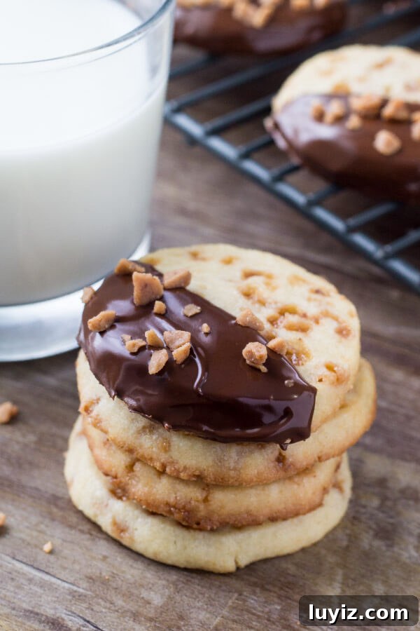Toffee Icebox Cookies Recipe: Crispy, Buttery No-Bake Treats 4 Soft, buttery, melt-in-your-mouth sugar cookies with golden edges. Filled with toffee pieces & dipped in chocolate.