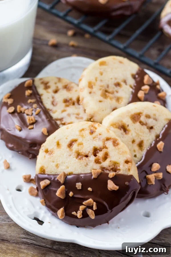 Toffee Icebox Cookies Recipe: Crispy, Buttery No-Bake Treats 6 Soft, buttery, melt-in-your-mouth sugar cookies with golden edges. Filled with toffee pieces & dipped in chocolate.