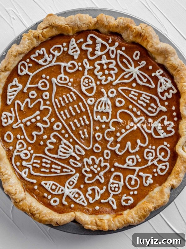 How to Make Sprinkled Heart Cupcakes: Step-by-Step Tutorial 11 Pumpkin pie with piped cream cheese decoration.
