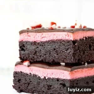 Two layered peppermint brownies, stacked on top of each other