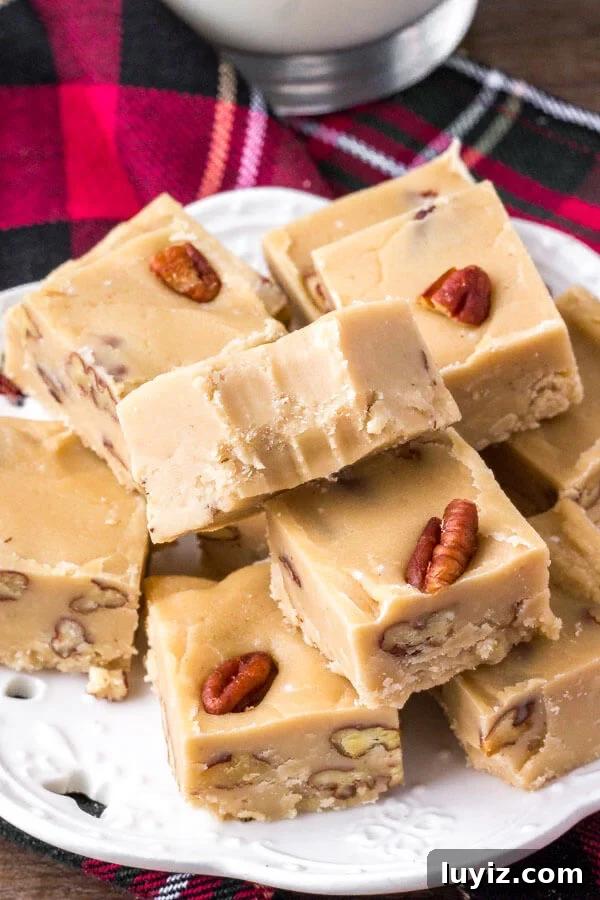 10 Last-Minute Christmas Treats to Impress Guests Quickly 9 A plate of homemade butter pecan fudge.
