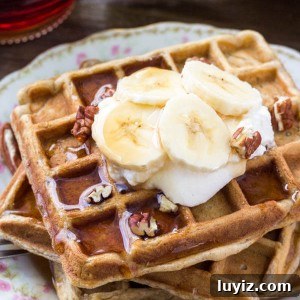 Cinnamon-Stuffed Banana Bread Waffles — Light & Fluffy 6 A stack of fluffy banana waffles taste like banana bread topped with maple syrup, whipped cream & sliced bananas.
