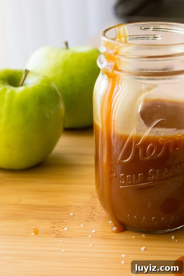 Easy Salted Caramel Sauce. Perfect with pretzels, apple slices, or dizzled on pancakes, cakes or ice cream - making this delicious caramel sauce only takes minutes.