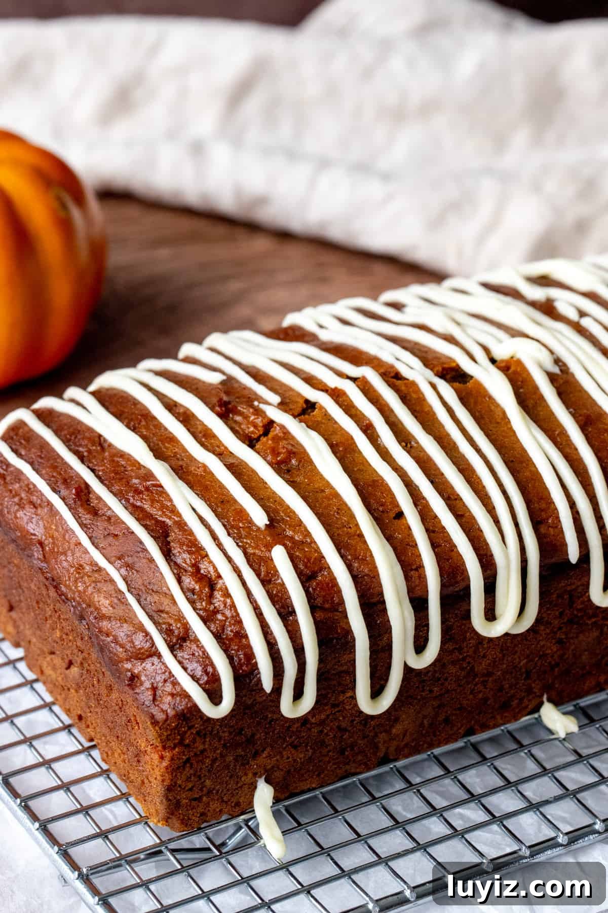 Moist Pumpkin Bread with Cream Cheese Glaze Recipe 2 Loaf of pumpkin bread drizzled with cream cheese glaze
