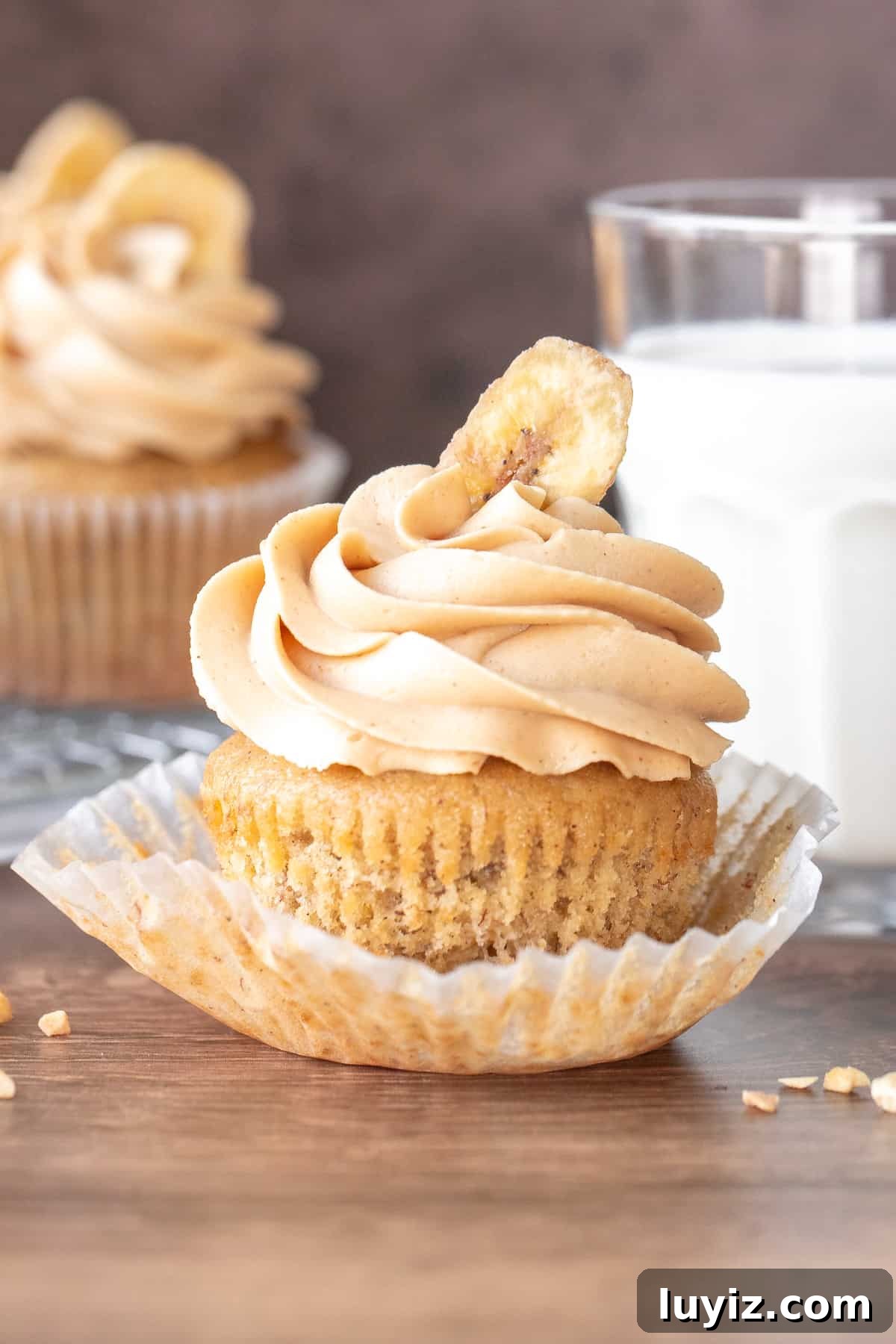 Peanut Butter Banana Cupcakes with Cream Cheese Frosting 3 banana peanut butter cupcake with glass of milk