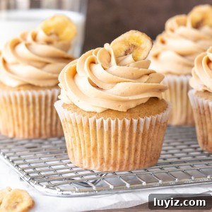 Banana peanut butter cupcakes on a cooling rack