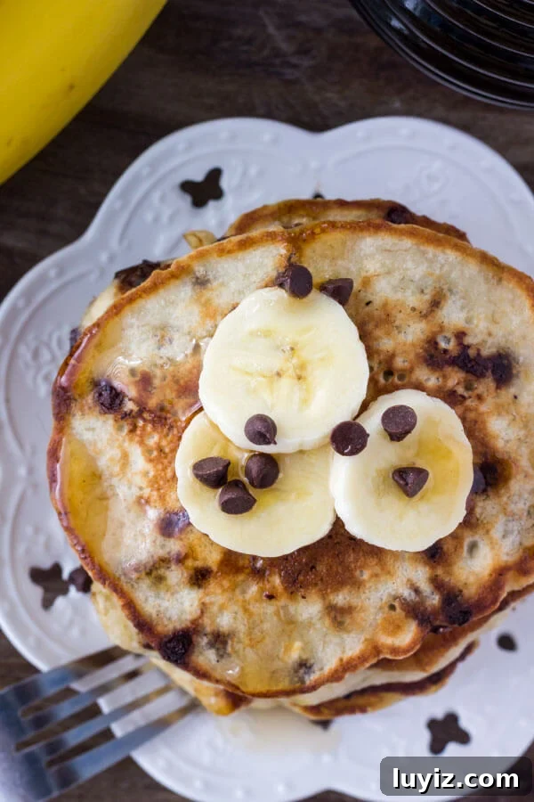 Fluffy Banana Chocolate Chip Pancakes Recipe 3 Chocolate Chip Banana Pancakes - extra fluffy with golden edges