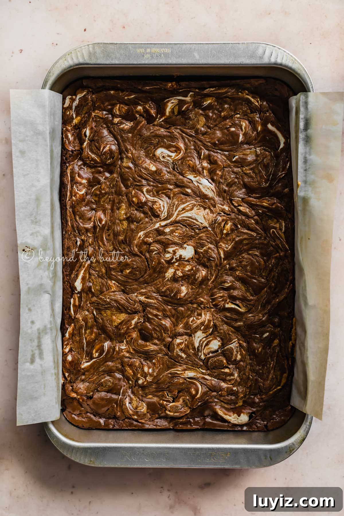 Marshmallow Peanut Butter Brownies Recipe — Gooey Chocolate Bars 3 Baking tray of uncut marshmallow peanut butter brownies | All Images © Beyond the Butter™