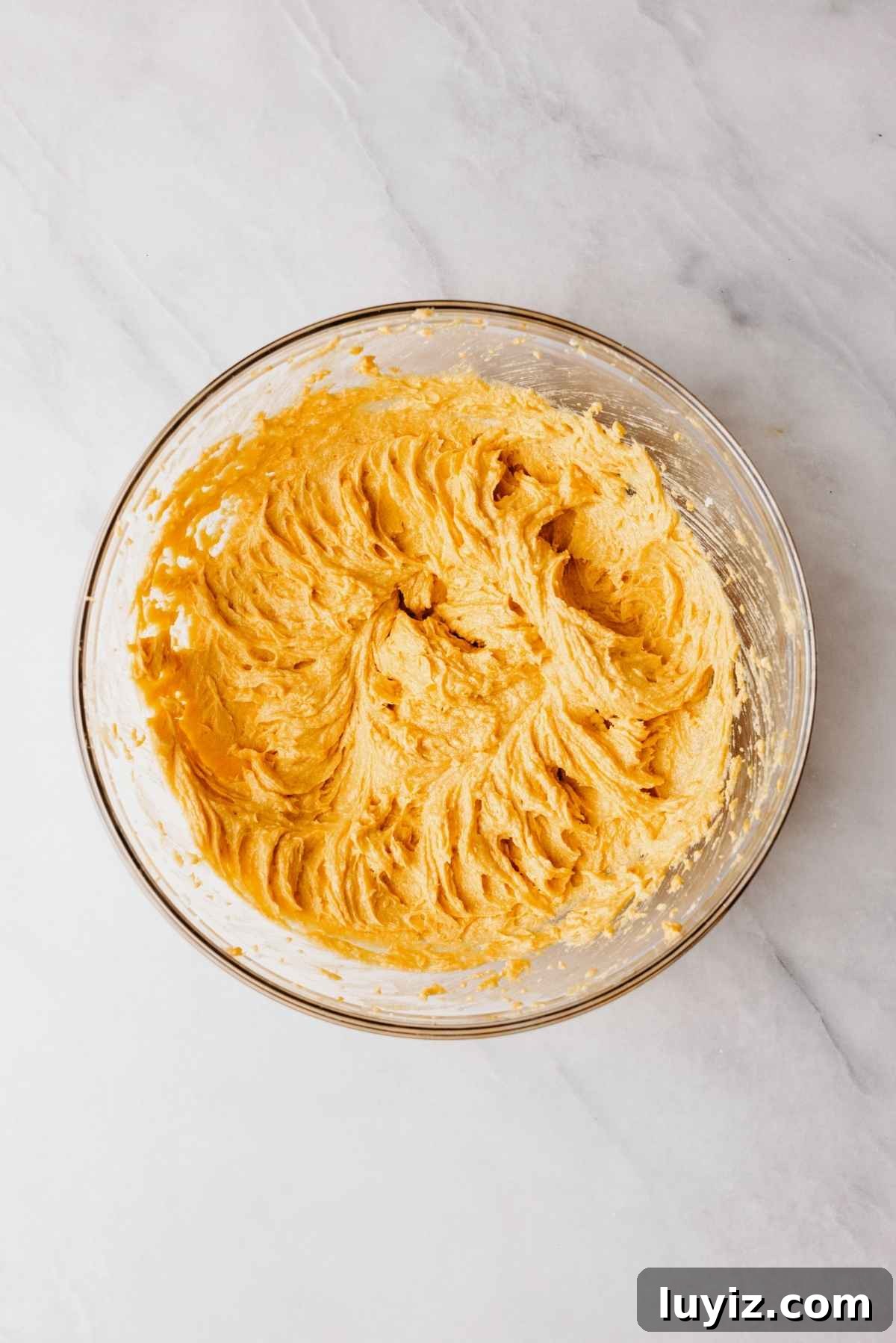 Pumpkin Whoopie Pies Recipe: Soft Spiced Sandwich Cookies 9 Egg, pumpkin puree, and vanilla extract blended into the shortening and sugar in large glass mixing bowl.