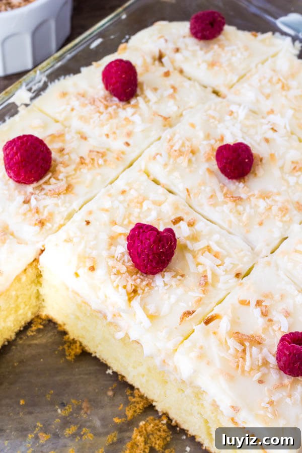Moist Coconut Layer Cake with Creamy Coconut Frosting 3 Homemade coconut cake with coconut frosting -moist, tender and filled with coconut.