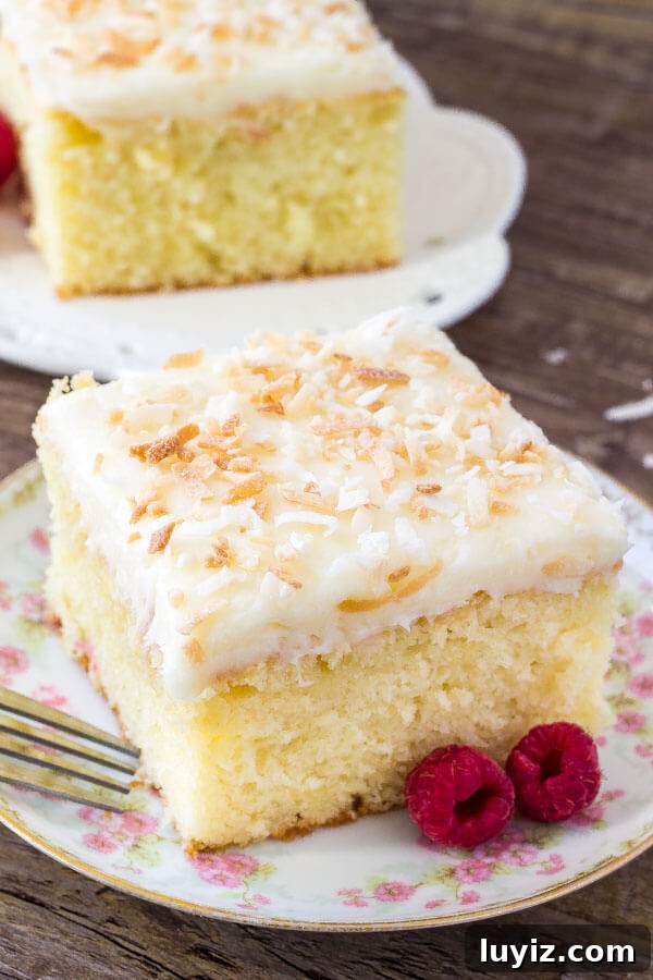 Moist Coconut Layer Cake with Creamy Coconut Frosting 4 Easy coconut cake with coconut frosting. This recipe is extra moist and infused with real coconut flavor.