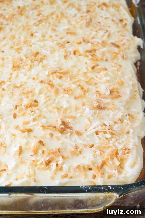 Moist Coconut Layer Cake with Creamy Coconut Frosting 5 Extra moist coconut cake with coconut buttercream and toasted coconut. Learn all the secrets of how to make coconut cake.