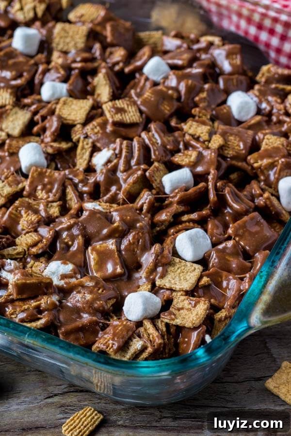 Golden Grahams S'mores Bars Recipe for Gooey Treats 3 Golden Grahams S'mores Bars - an easy no bake smores bar that's filled with milk chocolate and marshmallows.