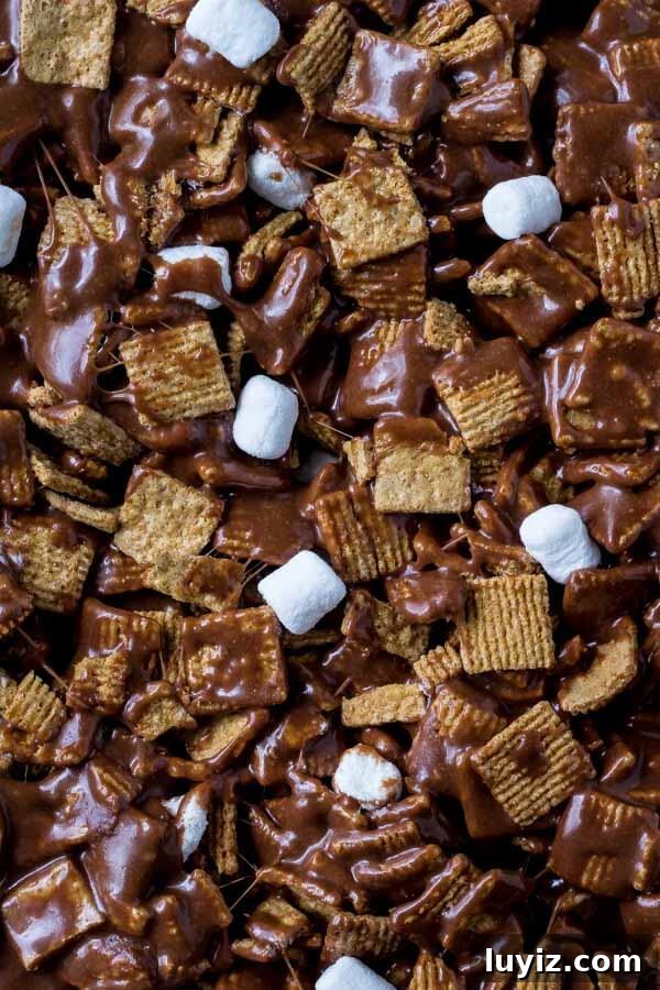 Golden Grahams S'mores Bars Recipe for Gooey Treats 4 Easy no bake S'mores Bars - made with golden grahams cereal, milk chocolate and tons of marshmallows.