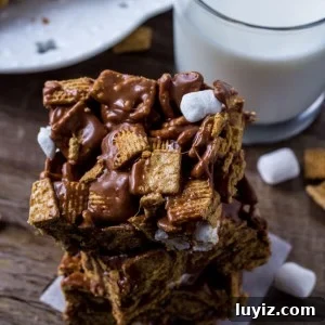Golden Grahams S'mores Bars Recipe for Gooey Treats 7 These Golden Grahams S'Mores Bars are gooey, chewy, a little crunchy, and the perfect way to enjoy s'mores indoors.