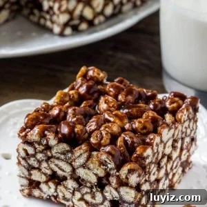 Puffed wheat squares are a classic, easy treat that always reminds me of childhood. They're chewy, gooey, full of chocolate, and you can whip up a batch of these no bake treats in no time.
