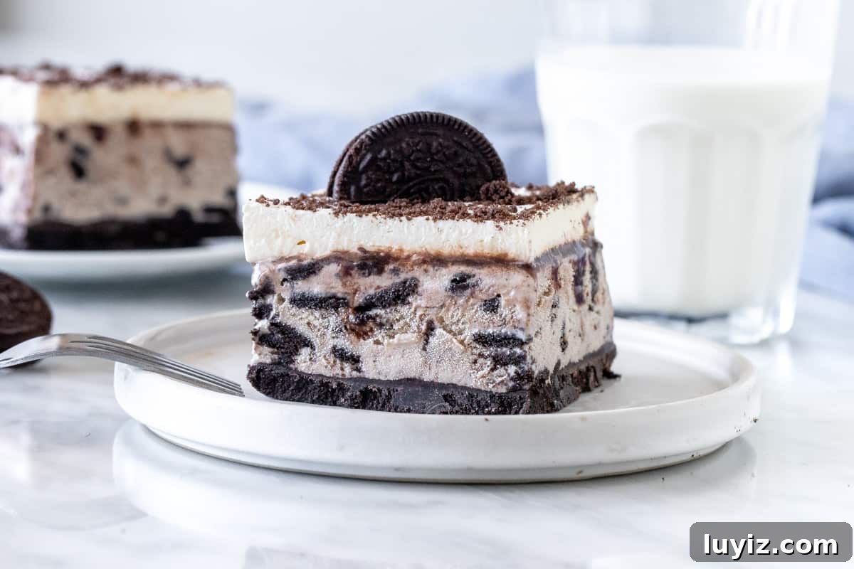 Ultimate Oreo Ice Cream Cake Recipe for Celebrations 5 Slice of cookies and cream ice cream cake