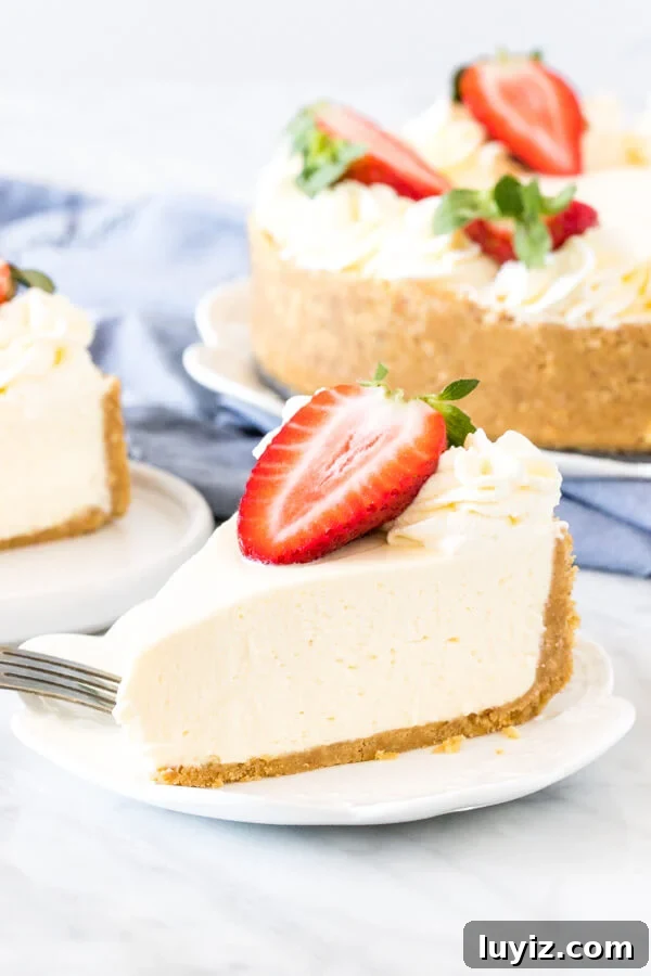 No-Bake Cheesecake Recipe with a Creamy Graham Cracker Crust 8 Slice of creamy no bake cheesecake with graham cracker crust.