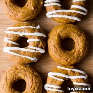 Baked Pumpkin Doughnuts Recipe: Light, Spiced Fall Treat 5 Baked Pumpkin Cake Doughnuts with Cream Cheese Glaze are the perfect fall treat. Ready in 30 minutes from start to finish - try them for breakfast or afternoon coffee!