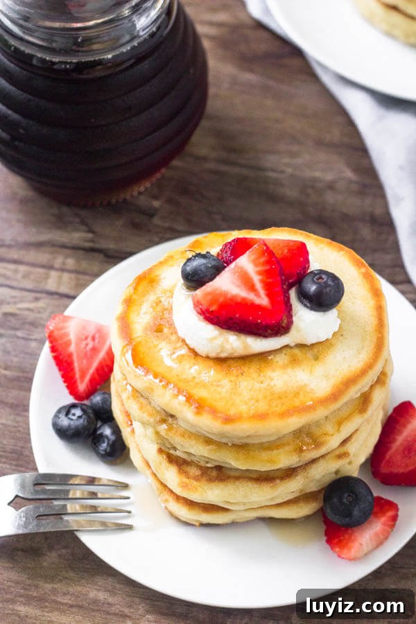 Fluffy Cream Cheese Pancakes with Vanilla and Lemon Zest 3 Cream cheese pancakes are the fluffiest pancakes around.
