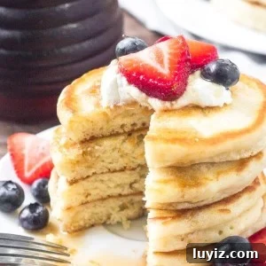 Adding a little cream cheese into your pancake batter makes for the fluffiest pancakes around.